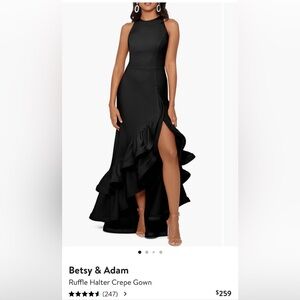 This is a black Betsy & Adam ruffle crepe gown.